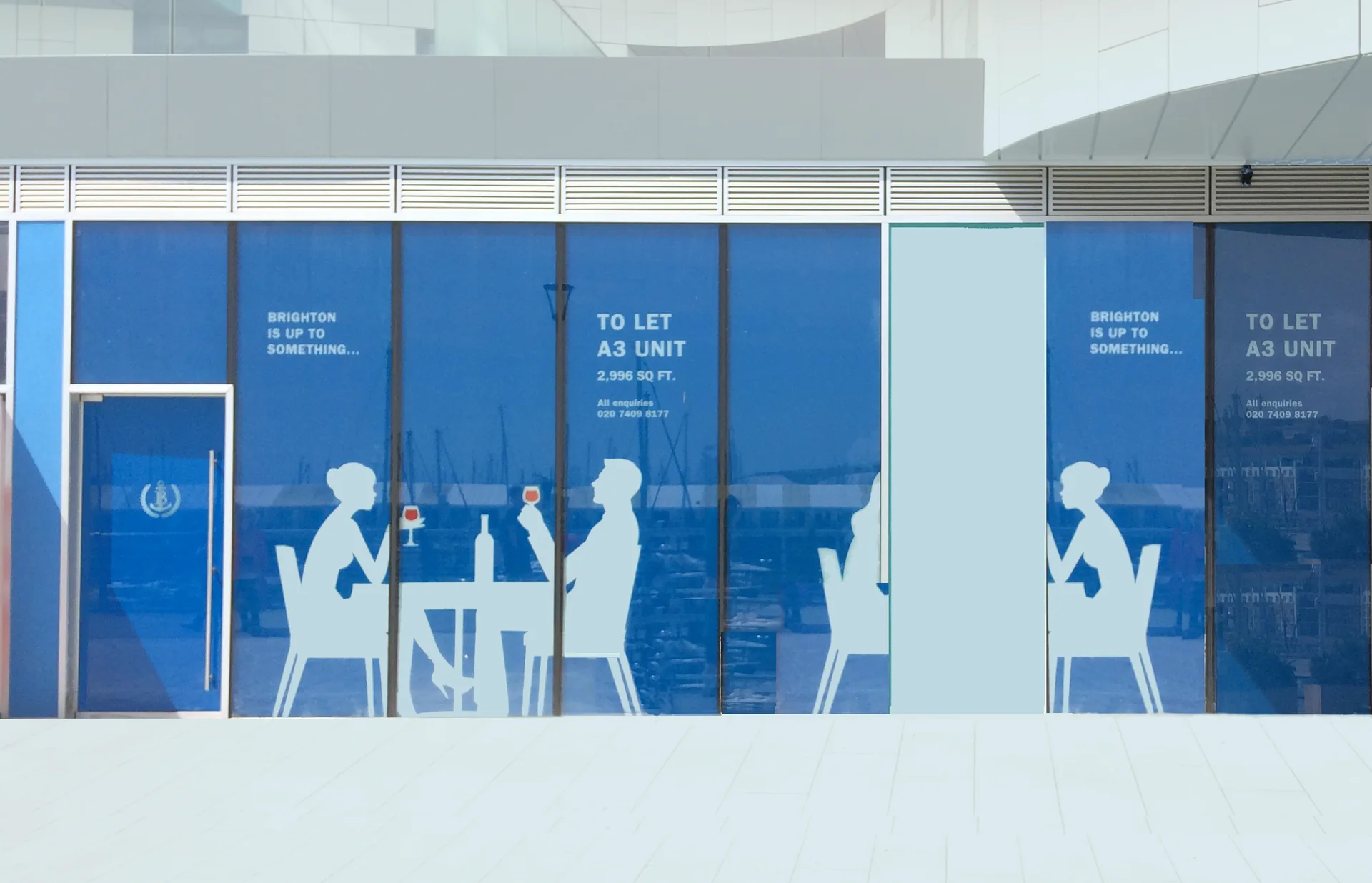 Savills Brighton commercial property window vinyl by City Images: large-format printed wraps installed across three storefront panels.
