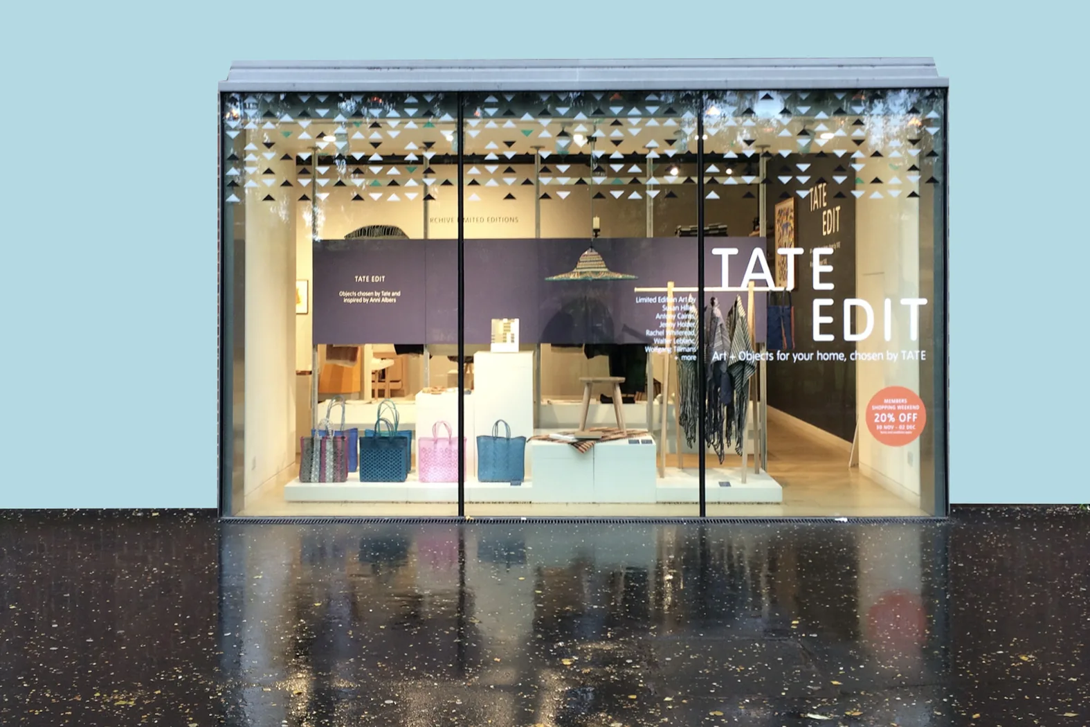 Large-format retail window vinyl by City Images: full storefront glazing graphics with cut-vinyl pattern and display branding.