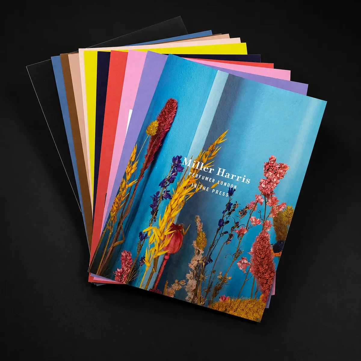 Fan of printed perfume brochures produced same day by City Images