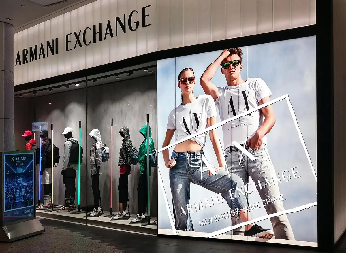 Backlit retail window display printed for a fashion flagship in London