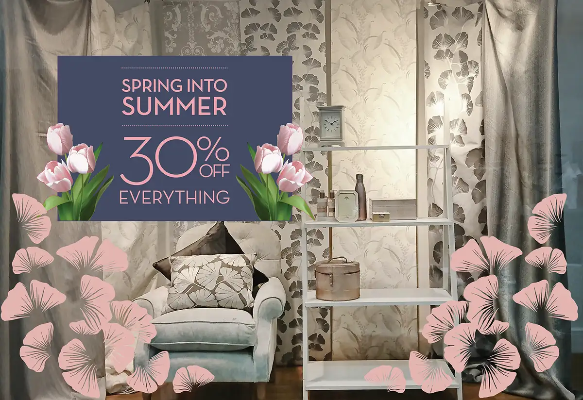 Cut window decals and promotional graphics on a retail window in London
