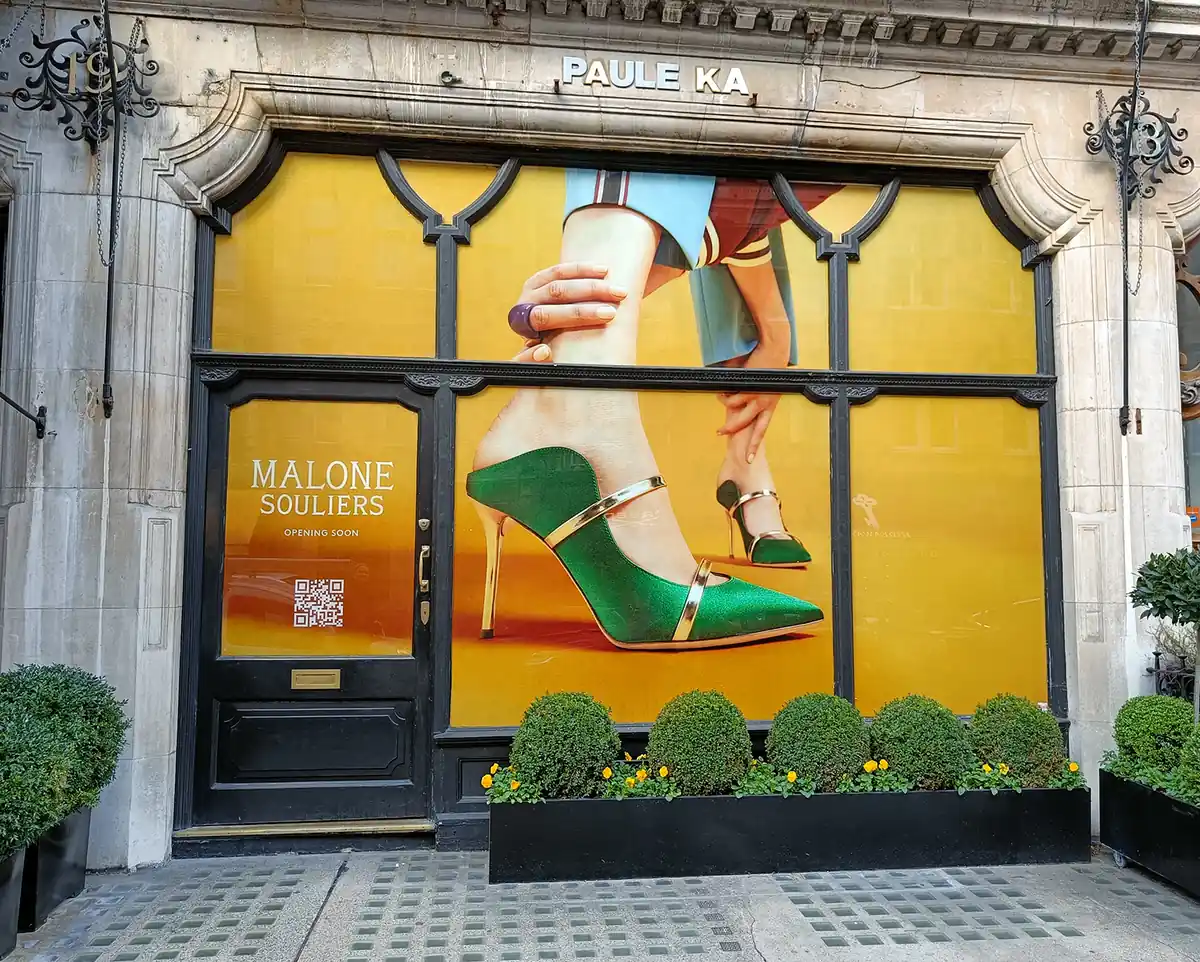 Full-coverage printed window vinyl across a luxury retail shopfront in London