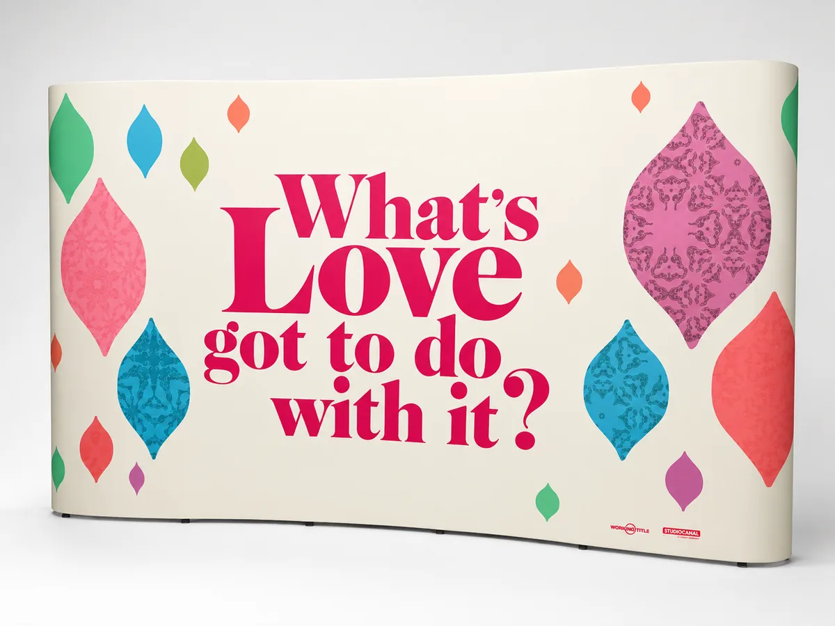 What's Love Got To Do With It curved pop-up display printed by City Images